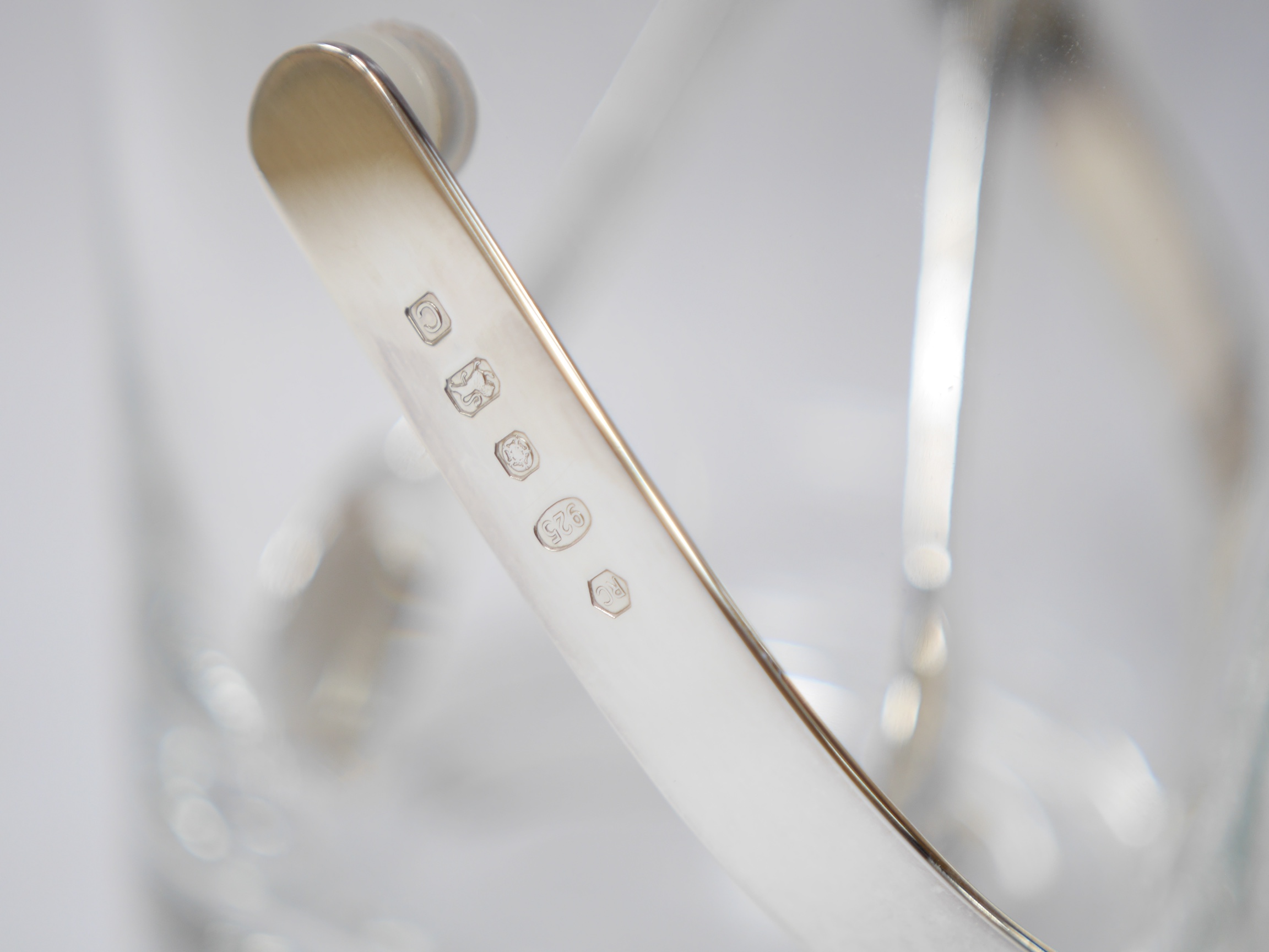 A modern silver handled glass ice bucket and a pair of silver tongs, by Carr's of Sheffield, Sheffield, 2002, height 12.4cm, Condition - good